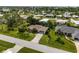 Scenic aerial view of a well-maintained home with lush landscaping at 8993 Bantry Bay Blvd, Englewood, FL 34224