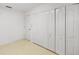 Neutral bedroom with built-in closet, offering ample storage at 8993 Bantry Bay Blvd, Englewood, FL 34224
