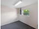 Well-lit bonus room featuring a window, providing versatility and extra space at 8993 Bantry Bay Blvd, Englewood, FL 34224