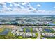 Expansive aerial view of community with houses and waterways at 17011 Sweetwater Village Dr, Bradenton, FL 34211