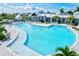 Large community pool with expansive deck and lounge areas at 17011 Sweetwater Village Dr, Bradenton, FL 34211