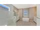 Bathroom with soaking tub, walk-in shower, and double vanity at 21285 Holmes Cir, Venice, FL 34293