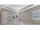 Bedroom with window and neutral-toned walls at 21285 Holmes Cir, Venice, FL 34293