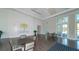 Bright and airy common area with seating for residents at 21285 Holmes Cir, Venice, FL 34293