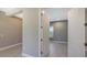 Open office space with view to kitchen at 21285 Holmes Cir, Venice, FL 34293