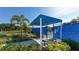Covered seating area near the pickleball courts at 21285 Holmes Cir, Venice, FL 34293