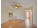 Light and bright living room with hardwood floors and ceiling fan at 1026 Bird Bay Way # 276, Venice, FL 34285
