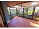 Enclosed patio with tiled floor, ceiling fan, and natural light at 5027 Kestral Park Dr # 64, Sarasota, FL 34231
