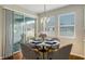 Kitchen dining area with round table and chairs at 11741 Brookside Dr, Bradenton, FL 34211