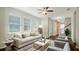 Living room with neutral colored couch and coffee table at 11741 Brookside Dr, Bradenton, FL 34211