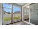 Screened porch with view of backyard at 11741 Brookside Dr, Bradenton, FL 34211