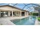 Resort-style pool area with covered lanai and patio at 12663 Fontana Loop, Bradenton, FL 34211