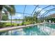 Relaxing pool and lanai overlooking a tranquil lake at 12663 Fontana Loop, Bradenton, FL 34211