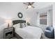 Guest bedroom with ceiling fan and window view at 10646 Spring Tide Way, Parrish, FL 34219