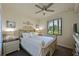 Cozy guest bedroom with full-size bed and neutral decor at 6515 Grand Estuary Trl # 105, Bradenton, FL 34212