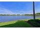 Serene view of a lake and lush green landscape at 6515 Grand Estuary Trl # 105, Bradenton, FL 34212