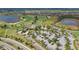 Resort-style clubhouse with ample parking and beautiful landscaping at 14717 Leopard Creek Pl, Lakewood Ranch, FL 34202