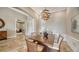Elegant dining room with hardwood floors and an open floor plan at 14717 Leopard Creek Pl, Lakewood Ranch, FL 34202