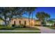 Beautiful home with manicured lawn and brick paver driveway at 14717 Leopard Creek Pl, Lakewood Ranch, FL 34202