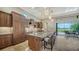 Gourmet kitchen boasts granite countertops and stainless steel appliances at 14717 Leopard Creek Pl, Lakewood Ranch, FL 34202