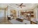 Open concept living room with kitchen views and comfortable seating at 14717 Leopard Creek Pl, Lakewood Ranch, FL 34202