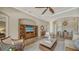 Bright and airy living room with hardwood floors and comfortable seating at 14717 Leopard Creek Pl, Lakewood Ranch, FL 34202
