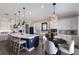Bright kitchen with a large island, modern appliances, and a cozy breakfast nook at 5510 Panella Ct, Palmetto, FL 34221