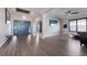 Open-concept living room featuring hard wood floors and modern decor at 5510 Panella Ct, Palmetto, FL 34221