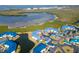 Aerial view of condo community by the water, highlighting building location at 835 Audubon Dr # 835, Bradenton, FL 34209