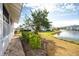 Relaxing backyard view with pond and neighboring homes at 835 Audubon Dr # 835, Bradenton, FL 34209