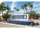Perico Bay Club entrance sign with palm trees at 835 Audubon Dr # 835, Bradenton, FL 34209