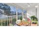 Relaxing screened lanai with cozy seating and scenic water views from the comfort of your home at 835 Audubon Dr # 835, Bradenton, FL 34209