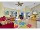 Bright and airy living room featuring lots of natural light, views of the water, and stylish, comfortable furnishings at 835 Audubon Dr # 835, Bradenton, FL 34209