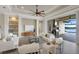 Bright and spacious living room with open floor plan and access to pool at 7216 Prestbury Cir, Lakewood Ranch, FL 34202