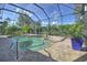 Inviting screened-in pool and spa area at 1362 Hedgewood Cir, North Port, FL 34288