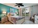 Comfortable bedroom with beachy decor and large window at 4480 Fairways Blvd # 109, Bradenton, FL 34209