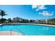 Sparkling resort-style pool with plenty of lounge chairs and a relaxing atmosphere at 4802 51St W St # 205, Bradenton, FL 34210