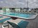Inviting community pool with lounge chairs at 5530 Denmark Dr, Bradenton, FL 34207