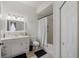 Clean bathroom with white vanity, bathtub, and shower at 5160 Northridge Rd # 309, Sarasota, FL 34238