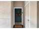 Inviting front door with a fall wreath at 5160 Northridge Rd # 309, Sarasota, FL 34238