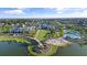 Community overview with clubhouse, pool, and lake at 1119 Waterline Ct, Sarasota, FL 34240