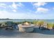 Relaxing fire pit with lake views at 1119 Waterline Ct, Sarasota, FL 34240