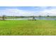 Scenic waterfront property with lush green grass at 1119 Waterline Ct, Sarasota, FL 34240