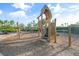 Wooden playground structure with climbing features for  at 1119 Waterline Ct, Sarasota, FL 34240