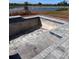 Un-finished pool with grey pavers at 1119 Waterline Ct, Sarasota, FL 34240