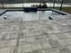 Relaxing pool with water feature and paver deck at 1119 Waterline Ct, Sarasota, FL 34240