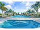 Resort-style pool with a spa and lounge area at 1119 Waterline Ct, Sarasota, FL 34240