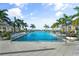 Large resort-style pool with lake view at 1119 Waterline Ct, Sarasota, FL 34240