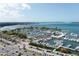 Aerial view of a marina with many boats and a waterfront park at 33 S Gulfstream Ave # 1007, Sarasota, FL 34236