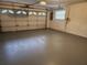 Attached garage with an automatic door opener and epoxy floor at 5402 60Th E St, Bradenton, FL 34203